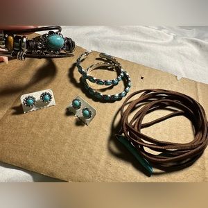 Three earrings and one bracelet and necklaces